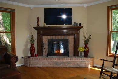 4 BR 2.5 bath home nestled on .55 acres (2 lots) surrounded by on White Bluff Resort - New Course in Texas - for sale on GolfHomes.com, golf home, golf lot
