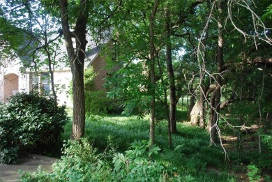 4 BR 2.5 bath home nestled on .55 acres (2 lots) surrounded by on White Bluff Resort - New Course in Texas - for sale on GolfHomes.com, golf home, golf lot