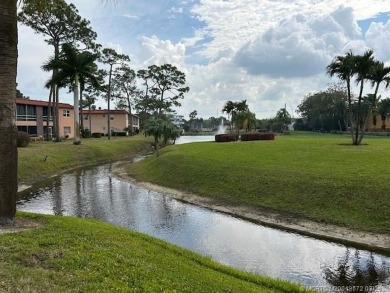 FIRST FLOOR CONDO WITH FANTASTIC VIEWS.   EAST SIDE OF PALM CITY on Monterey Yacht and Country Club in Florida - for sale on GolfHomes.com, golf home, golf lot