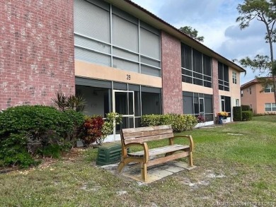 FIRST FLOOR CONDO WITH FANTASTIC VIEWS.   EAST SIDE OF PALM CITY on Monterey Yacht and Country Club in Florida - for sale on GolfHomes.com, golf home, golf lot