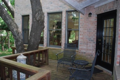 4 BR 2.5 bath home nestled on .55 acres (2 lots) surrounded by on White Bluff Resort - New Course in Texas - for sale on GolfHomes.com, golf home, golf lot