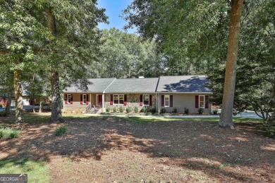 A rare gem in the highly desirable area of Cannongate! Located on Canongate Golf Club in Georgia - for sale on GolfHomes.com, golf home, golf lot