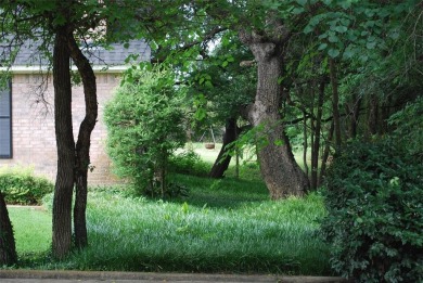 4 BR 2.5 bath home nestled on .55 acres (2 lots) surrounded by on White Bluff Resort - New Course in Texas - for sale on GolfHomes.com, golf home, golf lot