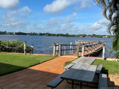 FIRST FLOOR CONDO WITH FANTASTIC VIEWS.   EAST SIDE OF PALM CITY on Monterey Yacht and Country Club in Florida - for sale on GolfHomes.com, golf home, golf lot