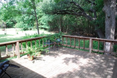 4 BR 2.5 bath home nestled on .55 acres (2 lots) surrounded by on White Bluff Resort - New Course in Texas - for sale on GolfHomes.com, golf home, golf lot