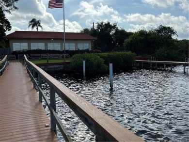 FIRST FLOOR CONDO WITH FANTASTIC VIEWS.   EAST SIDE OF PALM CITY on Monterey Yacht and Country Club in Florida - for sale on GolfHomes.com, golf home, golf lot