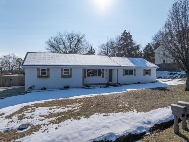 Welcome to this beautifully updated home, conveniently located on Cedars Country Club in Arkansas - for sale on GolfHomes.com, golf home, golf lot