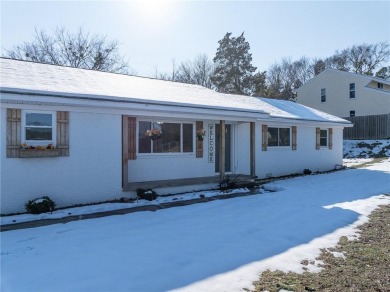 Welcome to this beautifully updated home, conveniently located on Cedars Country Club in Arkansas - for sale on GolfHomes.com, golf home, golf lot