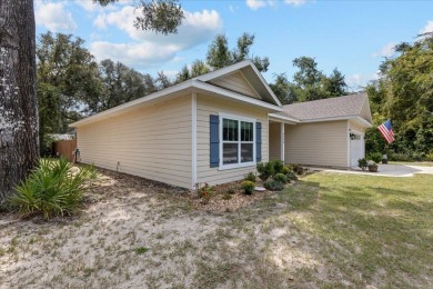 Quiet Community living in this 3 BD/2 BA home with 2-car garage on Chiefland Golf and Country Club in Florida - for sale on GolfHomes.com, golf home, golf lot