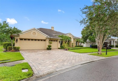 This beautifully updated waterfront pool home offers an on Westchase Golf Club in Florida - for sale on GolfHomes.com, golf home, golf lot
