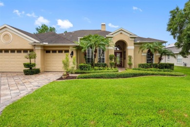This beautifully updated waterfront pool home offers an on Westchase Golf Club in Florida - for sale on GolfHomes.com, golf home, golf lot