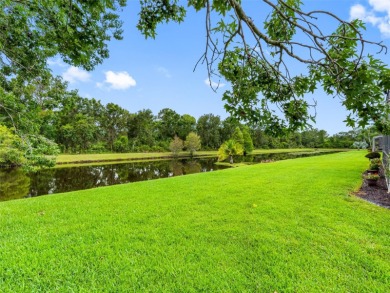 This beautifully updated waterfront pool home offers an on Westchase Golf Club in Florida - for sale on GolfHomes.com, golf home, golf lot