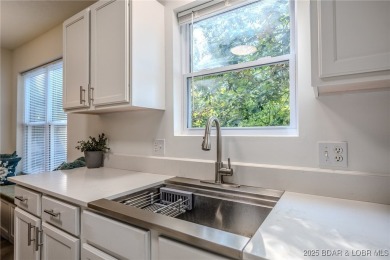 Just remodeled with high-end finishes, this beautiful home on The Oaks Golf Course in Missouri - for sale on GolfHomes.com, golf home, golf lot