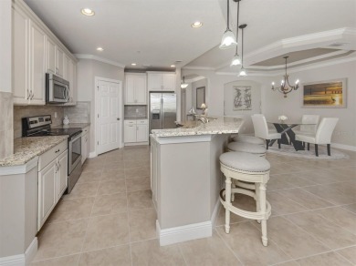 Come live the MAINTENANCE-FREE lifestyle in this beautifully on Venetian Golf and River Club in Florida - for sale on GolfHomes.com, golf home, golf lot