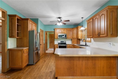 Welcome to 6180 Edison St in Hartville, Ohio - a stunning, solid on Sable Creek Golf Course in Ohio - for sale on GolfHomes.com, golf home, golf lot