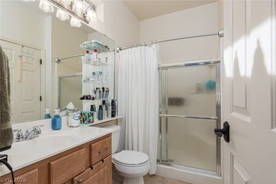 Charming single-story home in the heart of Sun City MacDonald on Desert Willow Golf Course in Nevada - for sale on GolfHomes.com, golf home, golf lot