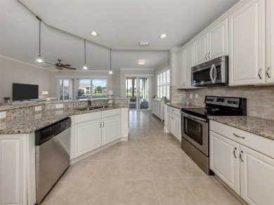 Come live the MAINTENANCE-FREE lifestyle in this beautifully on Venetian Golf and River Club in Florida - for sale on GolfHomes.com, golf home, golf lot