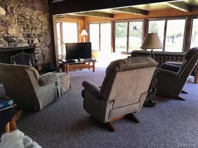 This home is in a private community owned by residents of the on Lost Lake Woods Club in Michigan - for sale on GolfHomes.com, golf home, golf lot