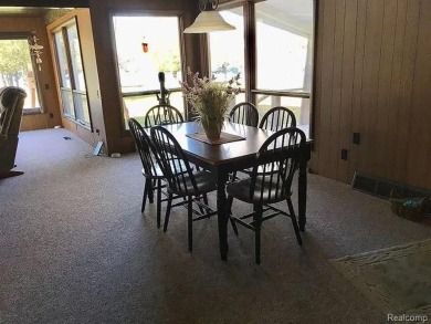 This home is in a private community owned by residents of the on Lost Lake Woods Club in Michigan - for sale on GolfHomes.com, golf home, golf lot