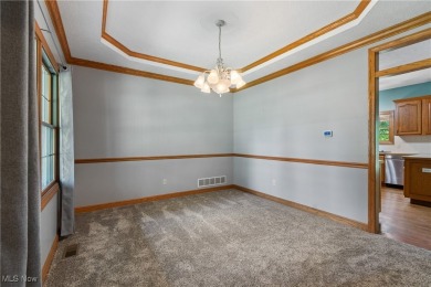 Welcome to 6180 Edison St in Hartville, Ohio - a stunning, solid on Sable Creek Golf Course in Ohio - for sale on GolfHomes.com, golf home, golf lot