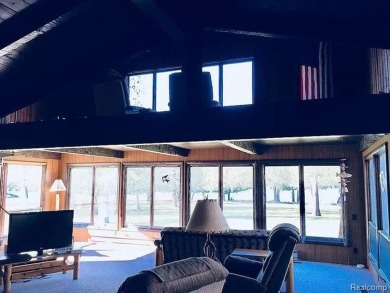 This home is in a private community owned by residents of the on Lost Lake Woods Club in Michigan - for sale on GolfHomes.com, golf home, golf lot