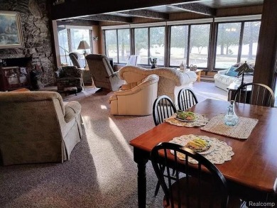 This home is in a private community owned by residents of the on Lost Lake Woods Club in Michigan - for sale on GolfHomes.com, golf home, golf lot