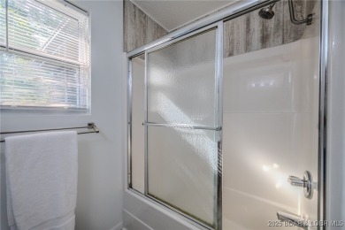 Just remodeled with high-end finishes, this beautiful home on The Oaks Golf Course in Missouri - for sale on GolfHomes.com, golf home, golf lot