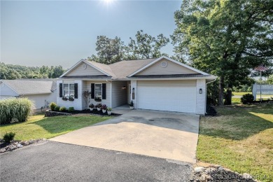Just remodeled with high-end finishes, this beautiful home on The Oaks Golf Course in Missouri - for sale on GolfHomes.com, golf home, golf lot