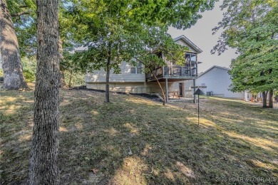 Just remodeled with high-end finishes, this beautiful home on The Oaks Golf Course in Missouri - for sale on GolfHomes.com, golf home, golf lot