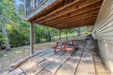 Just remodeled with high-end finishes, this beautiful home on The Oaks Golf Course in Missouri - for sale on GolfHomes.com, golf home, golf lot