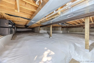 Just remodeled with high-end finishes, this beautiful home on The Oaks Golf Course in Missouri - for sale on GolfHomes.com, golf home, golf lot