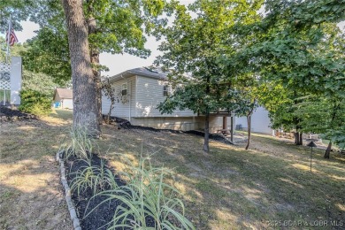 Just remodeled with high-end finishes, this beautiful home on The Oaks Golf Course in Missouri - for sale on GolfHomes.com, golf home, golf lot