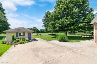 Welcome to 6180 Edison St in Hartville, Ohio - a stunning, solid on Sable Creek Golf Course in Ohio - for sale on GolfHomes.com, golf home, golf lot