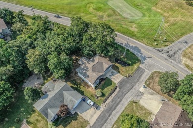 Just remodeled with high-end finishes, this beautiful home on The Oaks Golf Course in Missouri - for sale on GolfHomes.com, golf home, golf lot