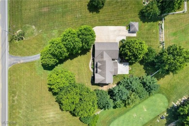 Welcome to 6180 Edison St in Hartville, Ohio - a stunning, solid on Sable Creek Golf Course in Ohio - for sale on GolfHomes.com, golf home, golf lot