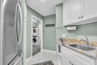 Welcome to refined living in one of the area's most desired on River Wilderness Golf and Country Club in Florida - for sale on GolfHomes.com, golf home, golf lot