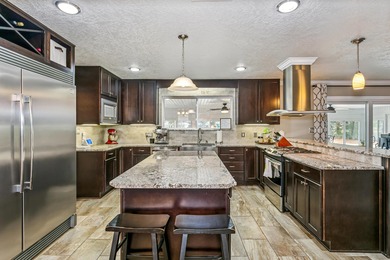 Positioned along the fairway in one of Shalimar's most on Shalimar Pointe Golf and Country Club in Florida - for sale on GolfHomes.com, golf home, golf lot