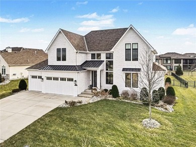 Built by Homes by Chris, this extraordinary 1.5-story home is a on Staley Farms Golf Club in Missouri - for sale on GolfHomes.com, golf home, golf lot