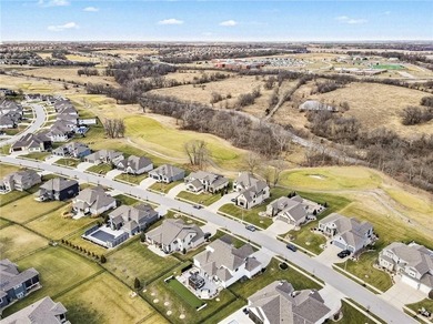 Built by Homes by Chris, this extraordinary 1.5-story home is a on Staley Farms Golf Club in Missouri - for sale on GolfHomes.com, golf home, golf lot