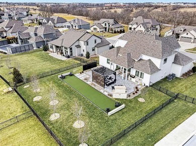 Built by Homes by Chris, this extraordinary 1.5-story home is a on Staley Farms Golf Club in Missouri - for sale on GolfHomes.com, golf home, golf lot