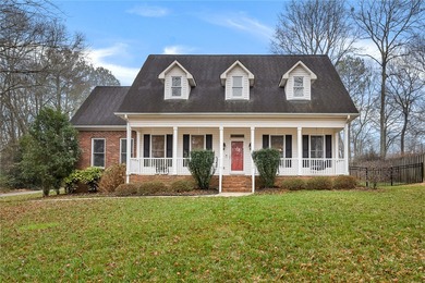 Welcome home to this beautifully maintained 4-bedroom, 2.5-bath on Cobbs Glen Country Club in South Carolina - for sale on GolfHomes.com, golf home, golf lot