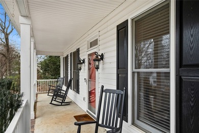 Welcome home to this beautifully maintained 4-bedroom, 2.5-bath on Cobbs Glen Country Club in South Carolina - for sale on GolfHomes.com, golf home, golf lot