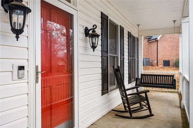 Welcome home to this beautifully maintained 4-bedroom, 2.5-bath on Cobbs Glen Country Club in South Carolina - for sale on GolfHomes.com, golf home, golf lot