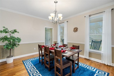 Welcome home to this beautifully maintained 4-bedroom, 2.5-bath on Cobbs Glen Country Club in South Carolina - for sale on GolfHomes.com, golf home, golf lot