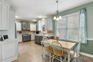 Welcome home to this beautifully maintained 4-bedroom, 2.5-bath on Cobbs Glen Country Club in South Carolina - for sale on GolfHomes.com, golf home, golf lot