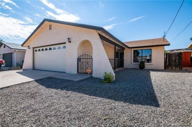 Beautiful freshly renovated 3-bedroom 2-bathroom 2 car garage on Cerbat Cliffs Golf Course in Arizona - for sale on GolfHomes.com, golf home, golf lot