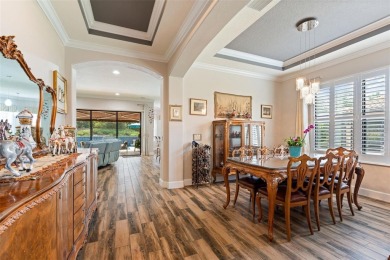 SPECTACULAR AND METICULOUSLY MAINTAINED THREE BEDROOM, DEN, 3 on Esplanade Golf and Country at Lakewood Ranch in Florida - for sale on GolfHomes.com, golf home, golf lot