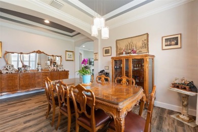 SPECTACULAR AND METICULOUSLY MAINTAINED THREE BEDROOM, DEN, 3 on Esplanade Golf and Country at Lakewood Ranch in Florida - for sale on GolfHomes.com, golf home, golf lot