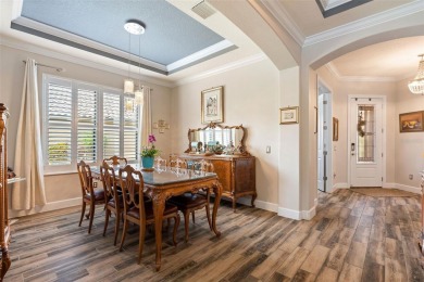 SPECTACULAR AND METICULOUSLY MAINTAINED THREE BEDROOM, DEN, 3 on Esplanade Golf and Country at Lakewood Ranch in Florida - for sale on GolfHomes.com, golf home, golf lot
