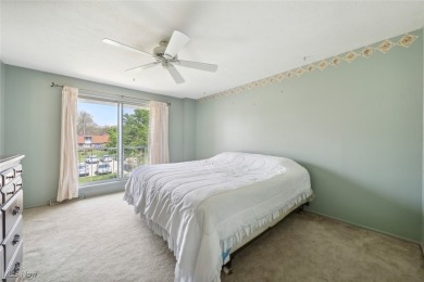 Welcome to this Mansard-roofed townhome nestled in the serene on Ridgewood Golf Course in Ohio - for sale on GolfHomes.com, golf home, golf lot